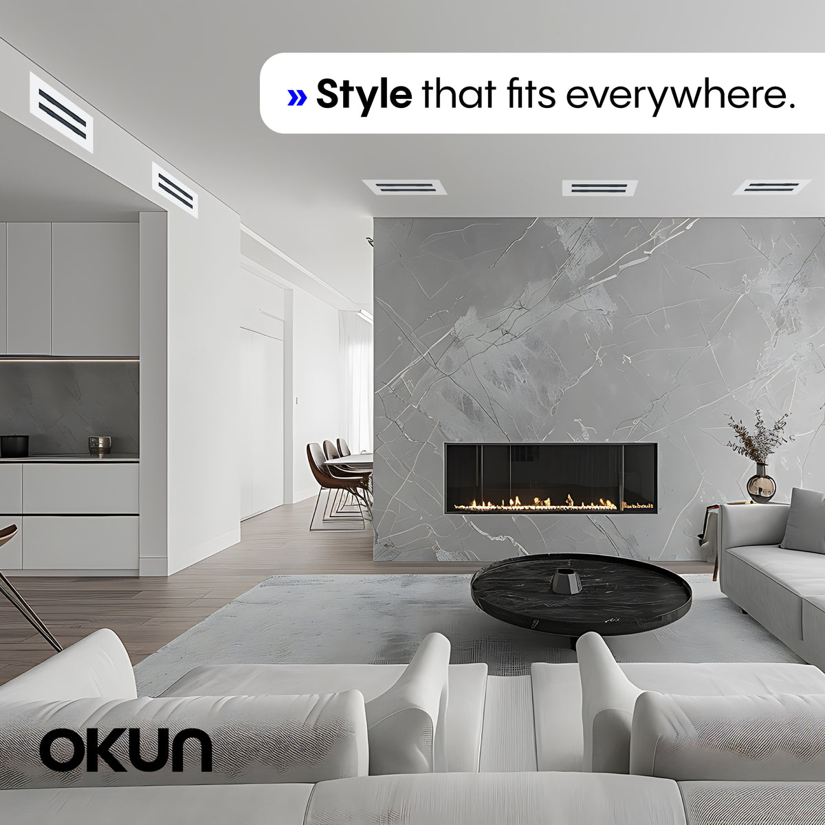 OKUN linear matte white vent grille with black louvers above a fireplace in a modern living room